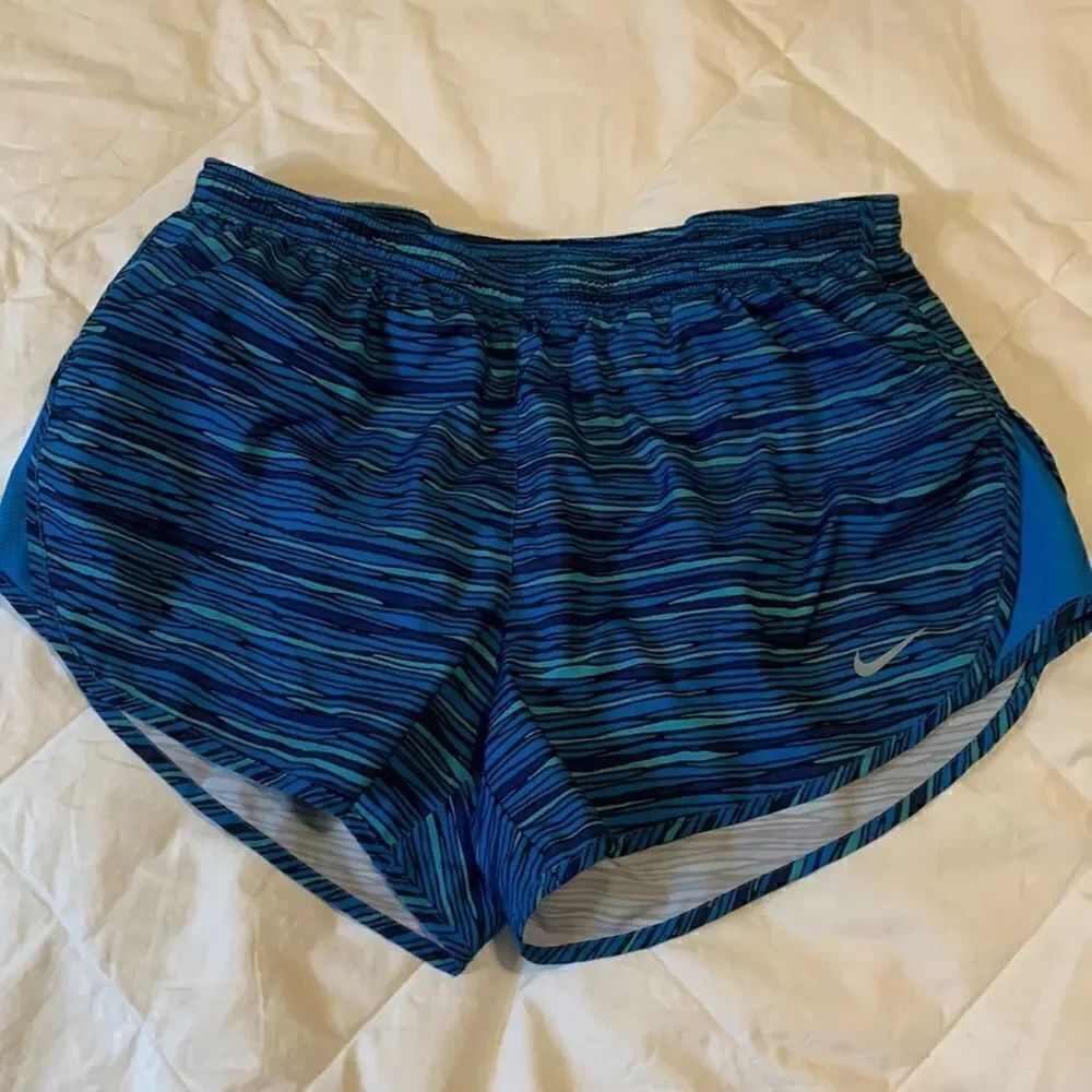 NIKE, running shorts, built in liner, draw cord and vent side, great condition